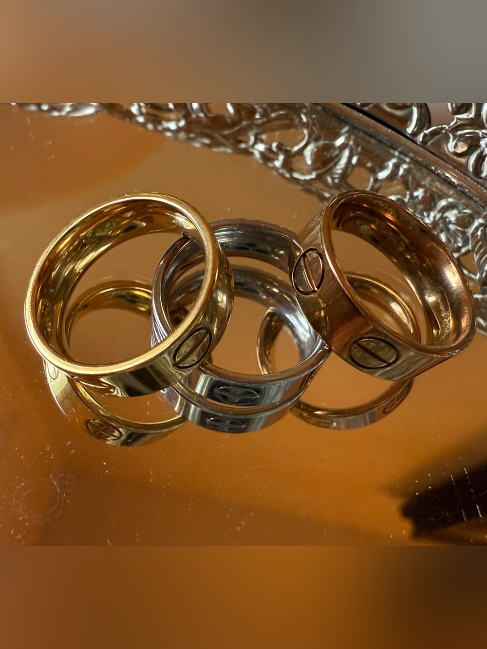 NWOT set of 3 stainless steel band screw motif rings size 5/6